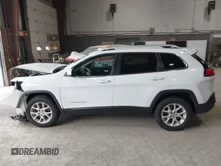2014 Jeep Cherokee Altitude with VIN 1C4PJMCB7EW186432, listed as a IAAI auction lot 42076018 with 150,186 mi miles and . Bid and sale history available at DreamBid. Image 14.