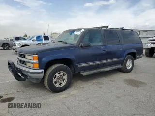 1997 Chevrolet Suburban z VIN 1GNFK16R9VJ309720, wystawiony jako Copart lot #48814475 z przebiegiem 198 109 mil mil oraz Czysty tytuł • Clean title. Historia ofert i sprzedaży dostępna na DreamBid. Obrazek 1.