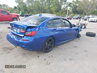 2020 BMW 3 Series M340i xDrive with VIN WBA5U9C00LA379345, listed as a IAAI auction lot 41256225 with 57,856 mi miles and . Bid and sale history available at DreamBid. Image 4.