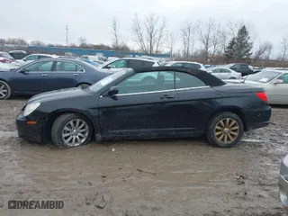 2010 Chrysler Sebring Touring with VIN 1C3BC5ED9AN138508, listed as a IAAI auction lot 41711330 with 93,877 mi miles. Bid and sale history available at carsss.com. Image 14.