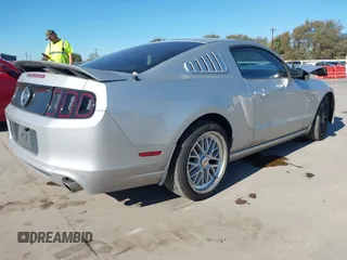 2013 Ford Mustang GT with VIN 1ZVBP8CF5D5232781, listed as a IAAI auction lot 40917812 with 130,447 mi miles. Bid and sale history available at carsss.com. Image 4.