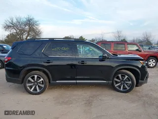 2024 Honda Pilot Touring with VIN 5FNYG1H72RB007519, listed as a IAAI auction lot 40973780 with 24,908 mi miles. Bid and sale history available at carsss.com. Image 13.