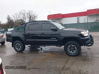 2015 Toyota Tacoma with VIN 3TMLU4ENXFM185371, listed as a IAAI auction lot 41952513 with 87,128 mi miles and . Bid and sale history available at DreamBid. Image 13.