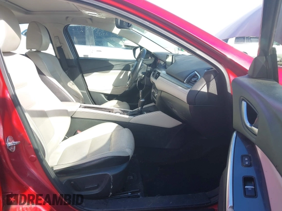 2016 Mazda 6 i Grand Touring with VIN JM1GJ1W57G1438524, listed as a IAAI auction lot 41365211 with 162,678 mi miles and . Bid and sale history available at DreamBid. Image 5.