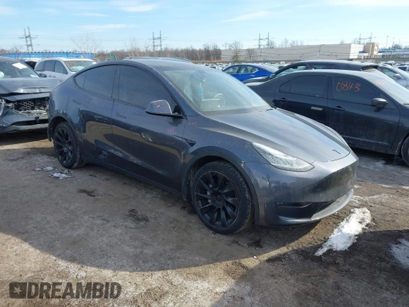 2022 Tesla Model Y Long Range z VIN 7SAYGDEE6NA013757, wystawiony jako IAAI lot #41364867 z przebiegiem 33 621 mil mil oraz . Historia ofert i sprzedaży dostępna na DreamBid. Obrazek 1.