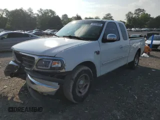 2000 Ford F-150 XL z VIN 1FTRX17LXYNA48550, wystawiony jako Copart lot #59751055 z przebiegiem 197 885 mil mil oraz Szkoda całkowita • Salvage title. Historia ofert i sprzedaży dostępna na DreamBid. Obrazek 1.