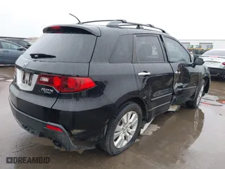 2012 Acura RDX with VIN 5J8TB2H24CA000446, listed as a IAAI auction lot 41958767 with 129,447 mi miles. Bid and sale history available at carsss.com. Image 4.