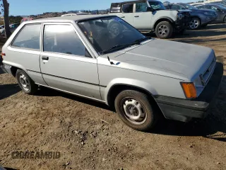 1986 Toyota Tercel z VIN JT2AL31G5G0429131, wystawiony jako Copart lot #79204554 z przebiegiem 124 477 mil mil oraz Szkoda całkowita • Salvage title. Historia ofert i sprzedaży dostępna na DreamBid. Obrazek 4.