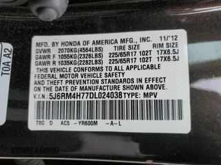2013 Honda CR-V EX-L z VIN 5J6RM4H77DL024038, wystawiony jako Copart lot #55598335 z przebiegiem 99 753 mil mil oraz Szkody całkowita. Historia ofert i sprzedaży dostępna na DreamBid. Obrazek 13.