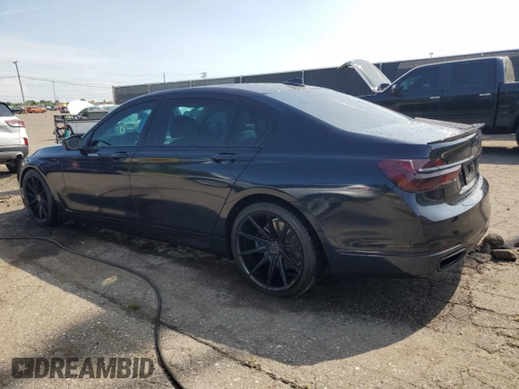 2016 BMW 7 Series 740i with VIN WBA7E2C56GG738788, listed as a Copart auction lot 60654015 with 96,059 mi miles and Clean title. Bid and sale history available at DreamBid. Image 2.