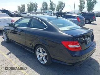 2014 Mercedes-Benz C-Class C 250 with VIN WDDGJ4HBXEG296917, listed as a IAAI auction lot 42068339 with 124,872 mi miles. Bid and sale history available at carsss.com. Image 3.
