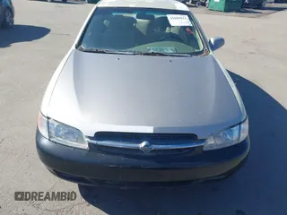1999 Nissan Altima XE with VIN 1N4DL01D2XC110847, listed as a IAAI auction lot 41685811 with 135,808 mi miles. Bid and sale history available at carsss.com. Image 6.