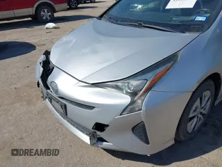 2016 Toyota Prius Four with VIN JTDKARFU9G3004190, listed as a IAAI auction lot 41667279 with 118,216 mi miles. Bid and sale history available at carsss.com. Image 6.