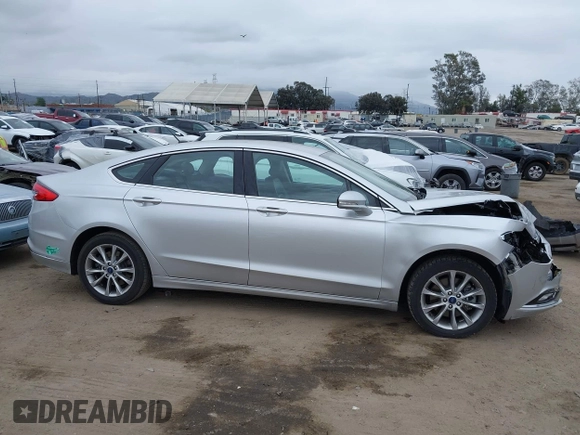 2017 Ford Fusion Energi SE with VIN 3FA6P0PU9HR354096, listed as a IAAI auction lot 42064703 with 69,601 mi miles. Bid and sale history available at carsss.com. Image 13.