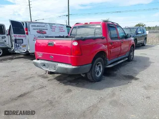 2005 Ford Explorer Sport Trac XLS with VIN 1FMZU67K65UA71317, listed as a IAAI auction lot 41523150 with 207,896 mi miles. Bid and sale history available at carsss.com. Image 4.