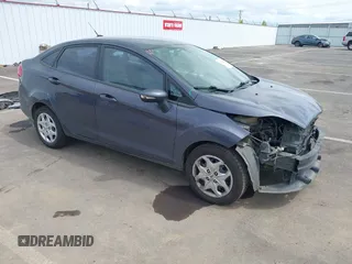 2013 Ford Fiesta SE z VIN 3FADP4BJ3DM186569, wystawiony jako IAAI lot #42128913 z przebiegiem 19 228 mil mil oraz . Historia ofert i sprzedaży dostępna na DreamBid. Obrazek 1.