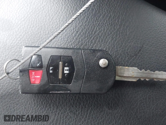 2013 Mazda 3 i SV z VIN JM1BL1TF2D1761375, wystawiony jako IAAI lot #42373558 z przebiegiem 150 196 mil mil oraz . Historia ofert i sprzedaży dostępna na DreamBid. Obrazek 11.