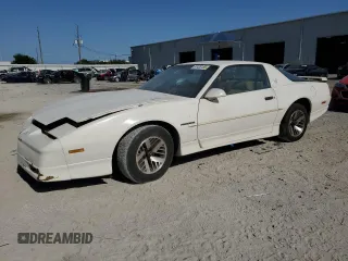 1989 Pontiac Firebird z VIN 1G2FS21S4KL260438, wystawiony jako Copart lot #57420155 z przebiegiem 132 101 mil mil oraz Czysty tytuł • Clean title. Historia ofert i sprzedaży dostępna na DreamBid. Obrazek 1.