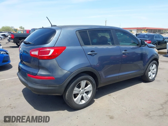2012 Kia Sportage LX z VIN KNDPB3A25C7237542, wystawiony jako IAAI lot #42397245 z przebiegiem 102 710 mil mil oraz . Historia ofert i sprzedaży dostępna na DreamBid. Obrazek 4.