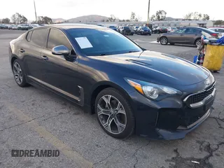 2020 Kia Stinger GT-Line with VIN KNAE15LA1L6086826, listed as a IAAI auction lot 41599914 with 133,493 mi miles. Bid and sale history available at carsss.com. Image 1.