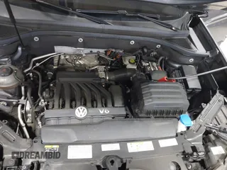 2021 Volkswagen Atlas SEL z VIN 1V2BE2CA6MC203777, wystawiony jako IAAI lot #42507511 z przebiegiem 76 358 mil mil oraz . Historia ofert i sprzedaży dostępna na DreamBid. Obrazek 10.