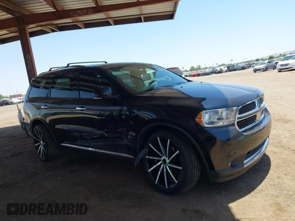 2013 Dodge Durango Crew with VIN 1C4RDHDG1DC508676, listed as a IAAI auction lot 42520380 with 126,250 mi miles and . Bid and sale history available at DreamBid. Image 6.
