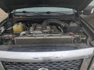 2016 Nissan Titan XD Platinum Reserve with VIN 1N6BA1F2XGN501136, listed as a Copart auction lot 82671694 with 79,469 mi miles and Salvage Title. Bid and sale history available at carsss.com. Image 11.