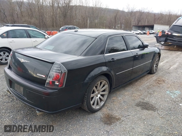 2006 Chrysler 300 C SRT8 with VIN 2C3KA73W06H239927, listed as a IAAI auction lot 41837066 with 169,260 mi miles. Bid and sale history available at carsss.com. Image 4.