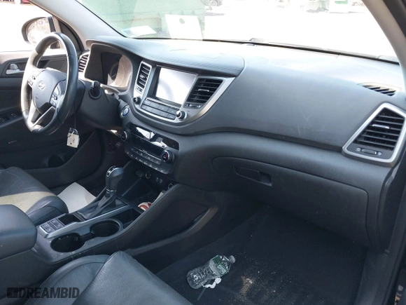 2018 Hyundai Tucson Value with VIN KM8J3CA26JU713729, listed as a IAAI auction lot 41950946 with 73,456 mi miles. Bid and sale history available at carsss.com. Image 5.