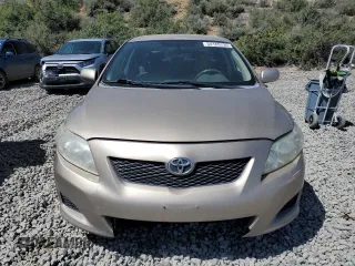 2010 Toyota Corolla with VIN 1NXBU4EE5AZ313656, listed as a Copart auction lot 54169735 with 0 mi miles and Clean Title. Bid and sale history available at carsss.com. Image 5.