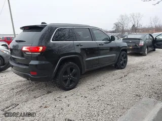 2015 Jeep Grand Cherokee Altitude with VIN 1C4RJFAG1FC210908, listed as a IAAI auction lot 41550173 with 168,905 mi miles. Bid and sale history available at carsss.com. Image 4.