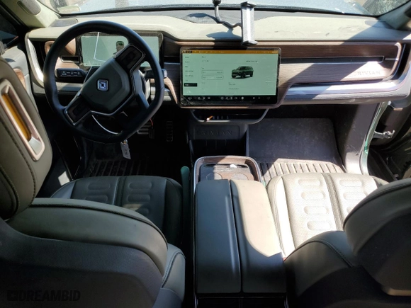 2023 Rivian R1S Launch Edition with VIN 7PDSGABL3PN000033, listed as a Copart auction lot 60131444 with 30,066 mi miles and Salvage Title. Bid and sale history available at carsss.com. Image 8.