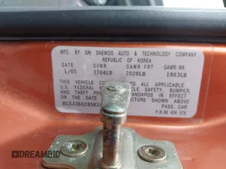 2005 Suzuki Reno z VIN KL5JJ66Z85K160610, wystawiony jako IAAI lot #41526883 z przebiegiem Nie podano mil oraz . Historia ofert i sprzedaży dostępna na DreamBid. Obrazek 9.