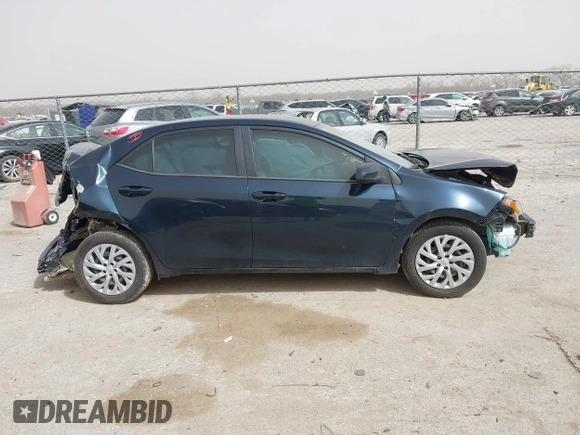 2018 Toyota Corolla L z VIN 5YFBURHE6JP840504, wystawiony jako IAAI lot #41790115 z przebiegiem 83 026 mil mil oraz . Historia ofert i sprzedaży dostępna na DreamBid. Obrazek 12.