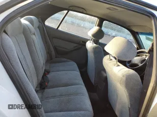 1994 Toyota Camry LE z VIN 4T1GK12E6RU003154, wystawiony jako Copart lot #41506975 z przebiegiem 142 037 mil mil oraz Szkoda całkowita • Salvage title. Historia ofert i sprzedaży dostępna na DreamBid. Obrazek 10.