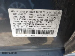 2007 Acura TSX with VIN JH4CL968X7C008894, listed as a IAAI auction lot 42029062 with 113,449 mi miles. Bid and sale history available at carsss.com. Image 9.