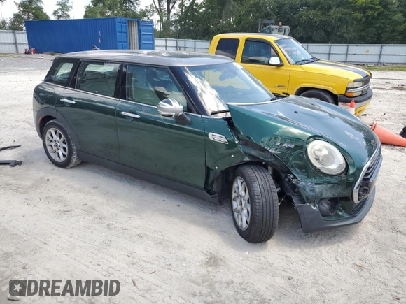 2016 MINI Clubman z VIN WMWLN5C5XG2E29275, wystawiony jako Copart lot #68162014 z przebiegiem 79 754 mil mil oraz Nie do naprawy. Historia ofert i sprzedaży dostępna na DreamBid. Obrazek 4.