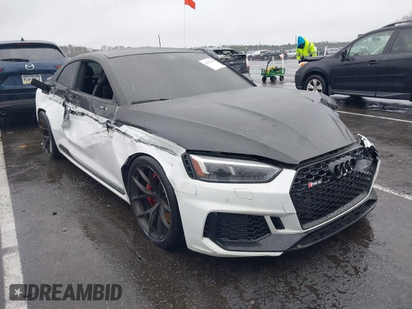 2018 Audi RS 5 z VIN WUAPWAF5XJA905043, wystawiony jako IAAI lot #41978868 z przebiegiem 60 838 mil mil oraz . Historia ofert i sprzedaży dostępna na DreamBid. Obrazek 1.