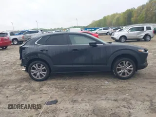 2020 Mazda CX-30 Select with VIN 3MVDMBCL3LM104988, listed as a IAAI auction lot 41951565 with 53,685 mi miles and . Bid and sale history available at DreamBid. Image 14.