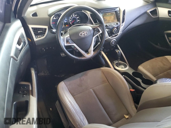 2013 Hyundai Veloster w/Gray Int z VIN KMHTC6AD8DU163465, wystawiony jako Copart lot #60276915 z przebiegiem 124 451 mil mil oraz Szkoda całkowita • Salvage title. Historia ofert i sprzedaży dostępna na DreamBid. Obrazek 8.