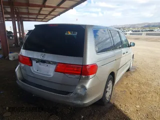 2009 Honda Odyssey LX with VIN 5FNRL38289B049418, listed as a IAAI auction lot 41777253 with 151,512 mi miles and . Bid and sale history available at DreamBid. Image 4.