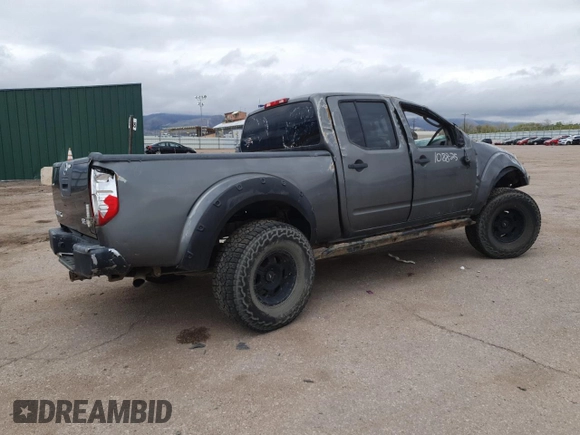 2008 Nissan Frontier LE with VIN 1N6AD09W58C437225, listed as a Copart auction lot 52687295 with 247,258 mi miles and Salvage title. Bid and sale history available at DreamBid. Image 3.