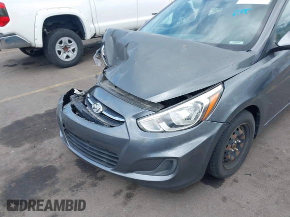 2015 Hyundai Accent GLS with VIN KMHCT4AE8FU825898, listed as a IAAI auction lot 42066640 with 79,593 mi miles and . Bid and sale history available at DreamBid. Image 6.
