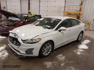 2020 Ford Fusion SE with VIN 3FA6P0HD0LR261278, listed as a IAAI auction lot 41607048 with 103,412 mi miles. Bid and sale history available at carsss.com. Image 2.