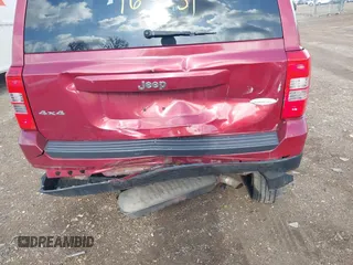 2014 Jeep Patriot Latitude with VIN 1C4NJRFB0ED628074, listed as a IAAI auction lot 41946451 with 92,118 mi miles and . Bid and sale history available at carsss.com. Image 6.