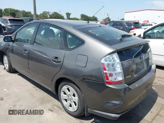 2007 Toyota Prius z VIN JTDKB20U173242693, wystawiony jako IAAI lot #42310546 z przebiegiem 250 887 mil mil oraz . Historia ofert i sprzedaży dostępna na DreamBid. Obrazek 3.