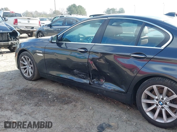 2014 BMW 5 Series 535d with VIN WBAXA5C52ED689245, listed as a IAAI auction lot 41016152 with 95,392 mi miles and . Bid and sale history available at carsss.com. Image 6.