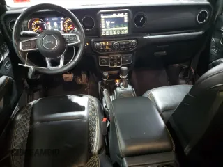 2021 Jeep Wrangler Unlimited Sahara Altitude with VIN 1C4HJXEN1MW692690, listed as a Copart auction lot 84927014 with 34,268 mi miles and Salvage title. Bid and sale history available at DreamBid. Image 8.