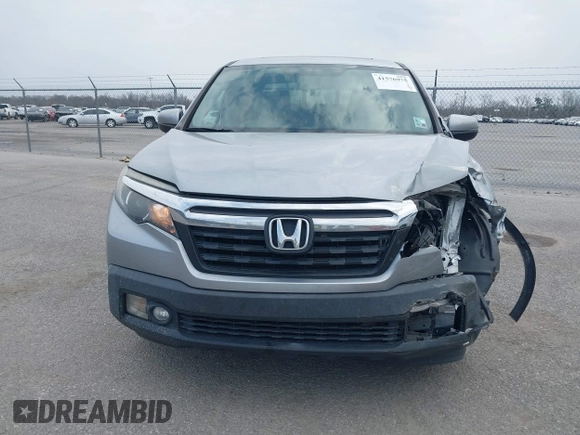 2019 Honda Ridgeline RTL with VIN 5FPYK2F50KB004055, listed as a IAAI auction lot 41576975 with 128,620 mi miles and . Bid and sale history available at DreamBid. Image 12.