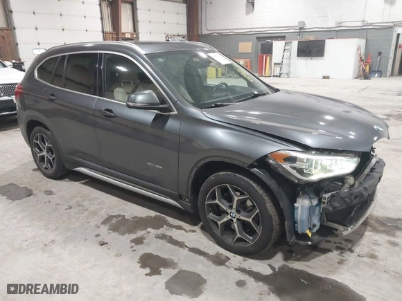 2016 BMW X1 xDrive28i with VIN WBXHT3C3XG5E47536, listed as a IAAI auction lot 41672144 with 97,932 mi miles. Bid and sale history available at carsss.com. Image 1.